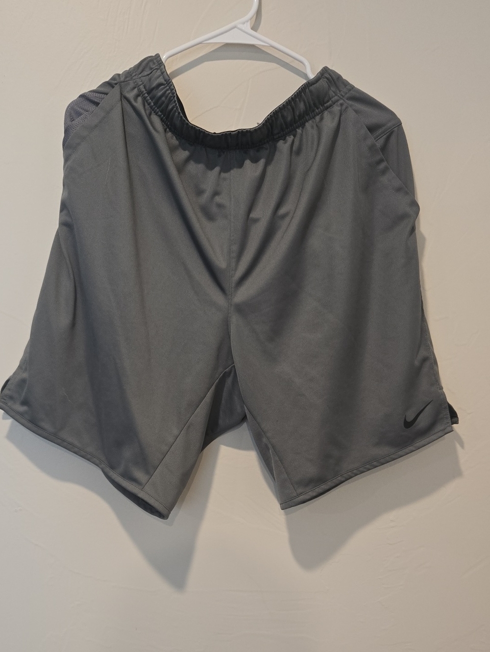 Nike Men's Dark Gray Athletic Shorts with Subtle Swoosh
